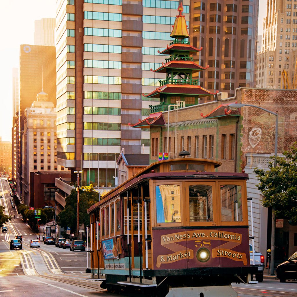 cable car with buildings in the background