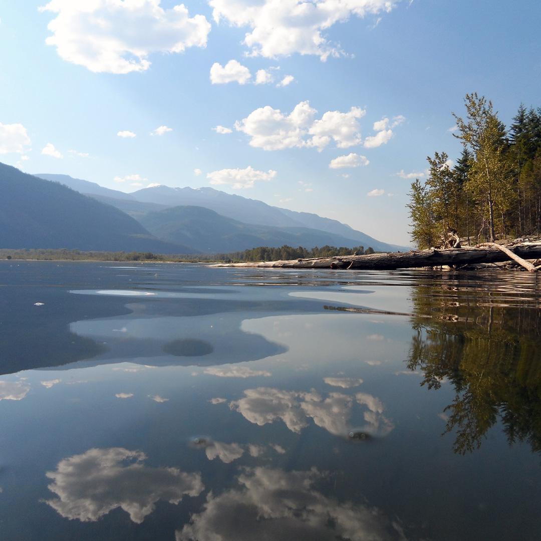 Glossy water of Kootenay Lake.