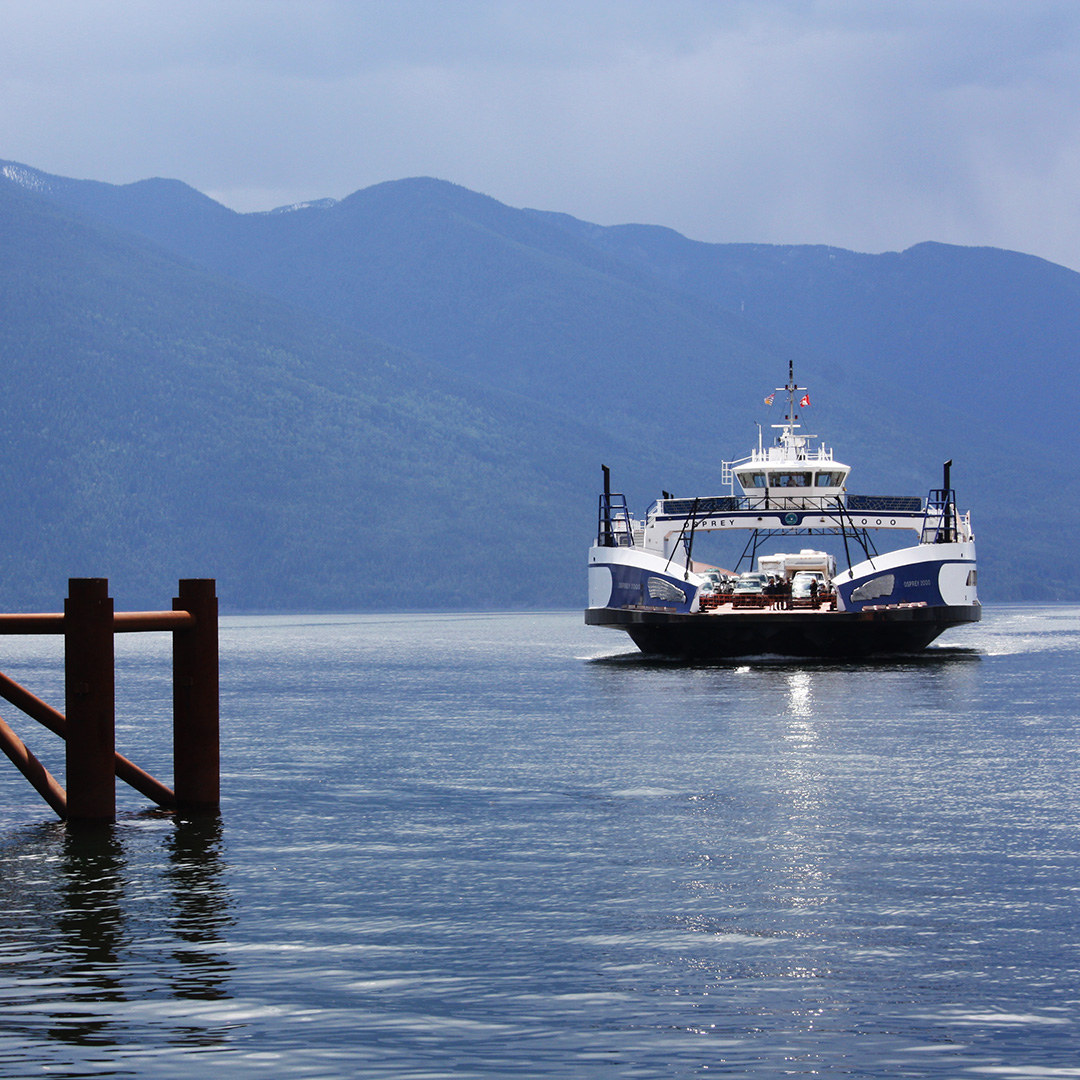 The Kootenay Lake Ferry approaches the dock.