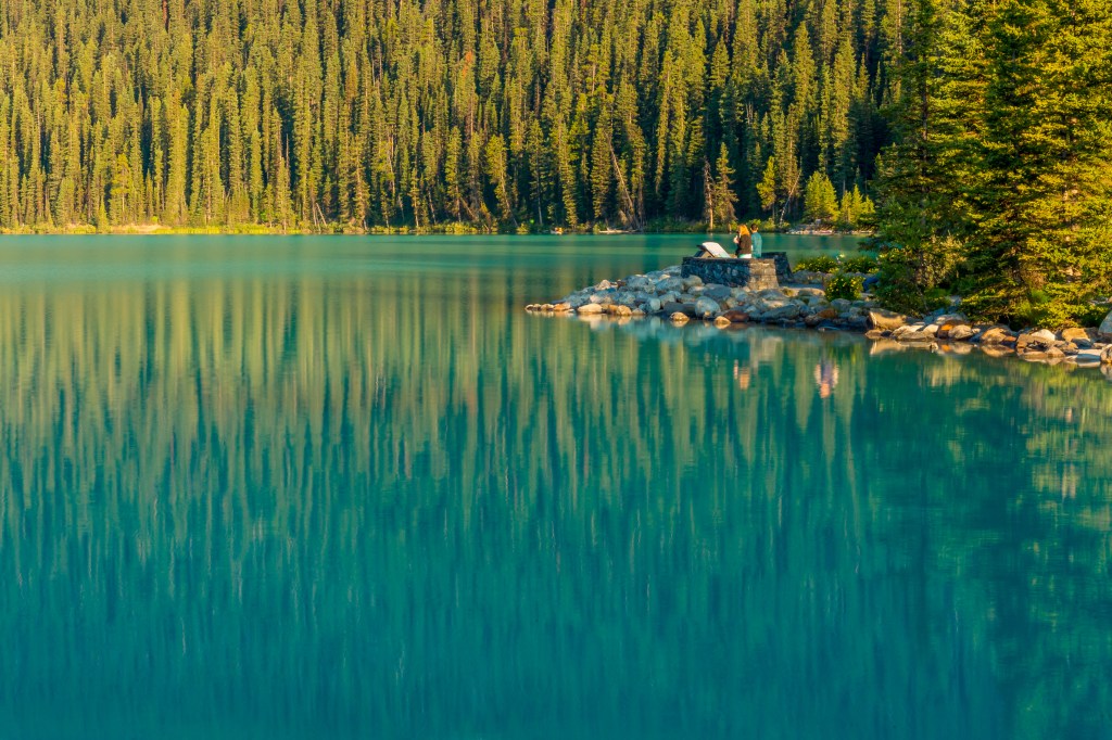 travelers viewing Lake Louise