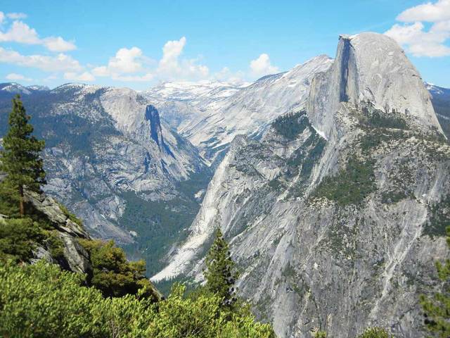 view of glacier point in yosemite under blue skies